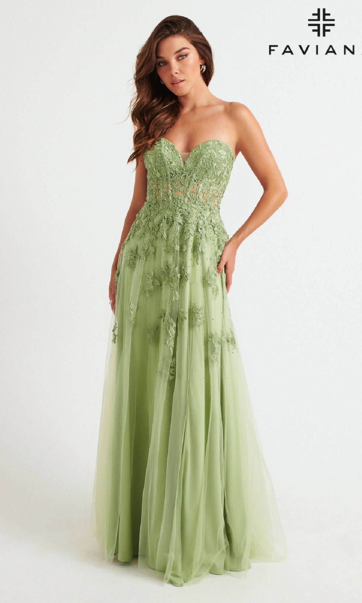A woman models the Faviana Strapless Sweetheart Long Lace Prom Dress in light green with floral lace details against a white background. The